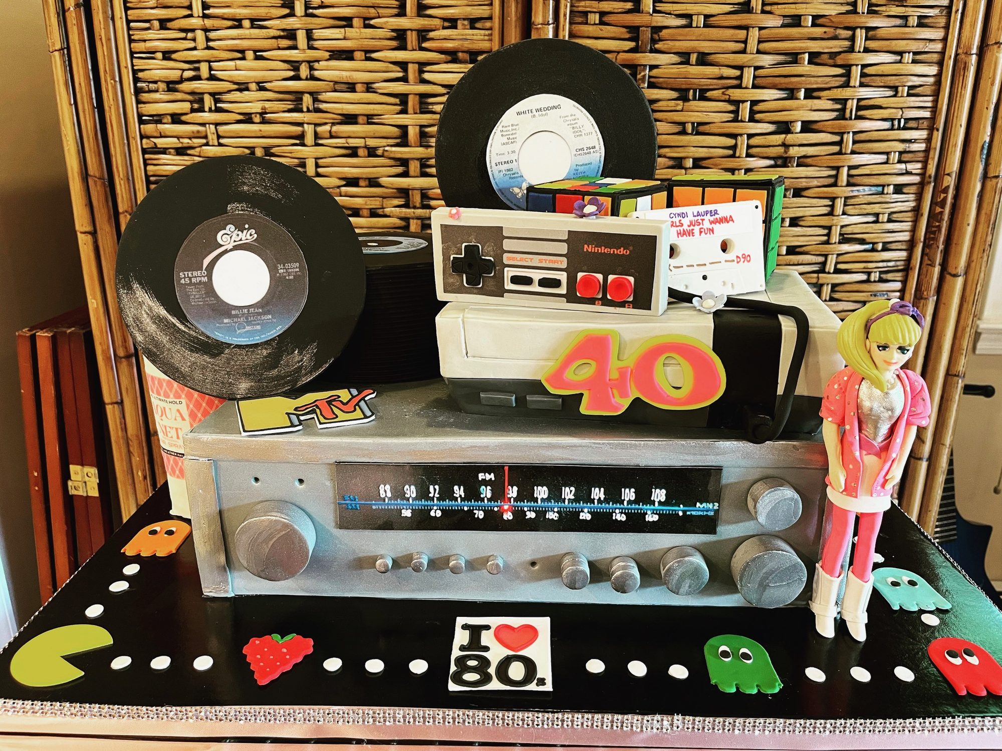 1980s 40th birthday cake with a sculpted stereo and game console