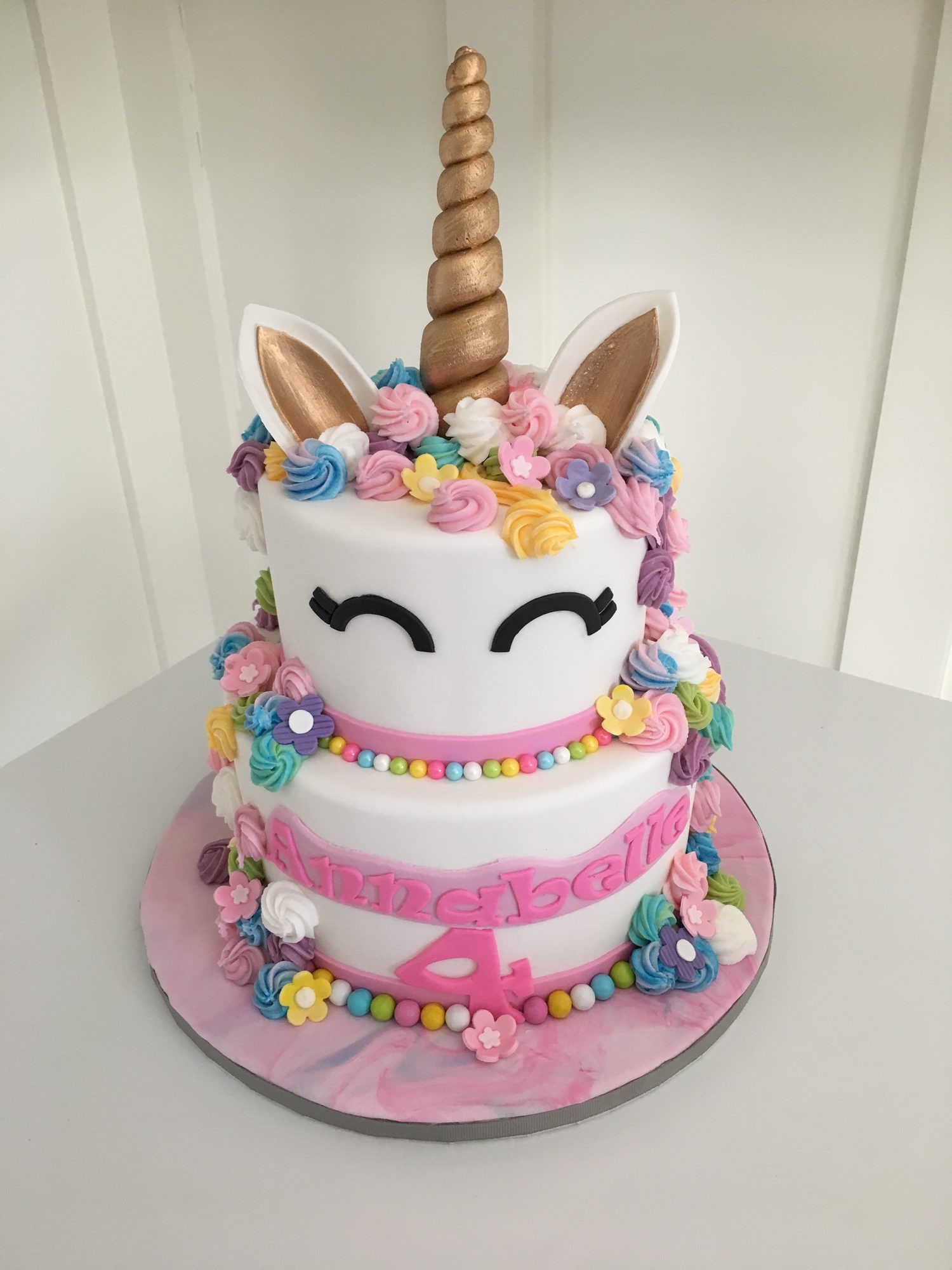 Hand-sculpted unicorn birthday cake