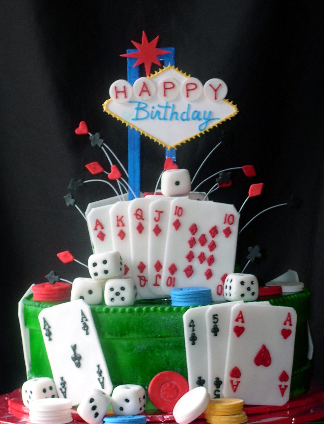 Las Vegas birthday cake with playing cards and dice